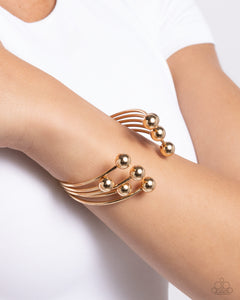 Assembly Line - Gold Bracelet - Paparazzi Accessories