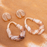 High-Sheen Swirls - Gold Post Earrings - Paparazzi Accessories