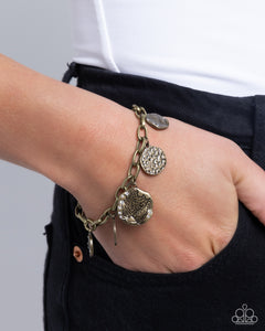 Winking Wild - Brass Bracelet - Paparazzi Accessories