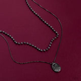 Lyrical Luminescence - Black Necklace - Paparazzi Accessories