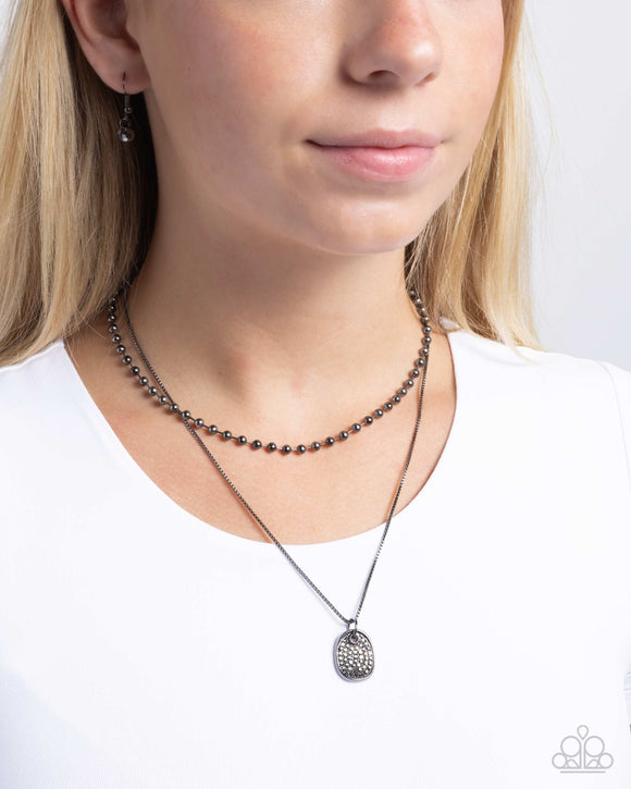 Lyrical Luminescence - Black Necklace - Paparazzi Accessories